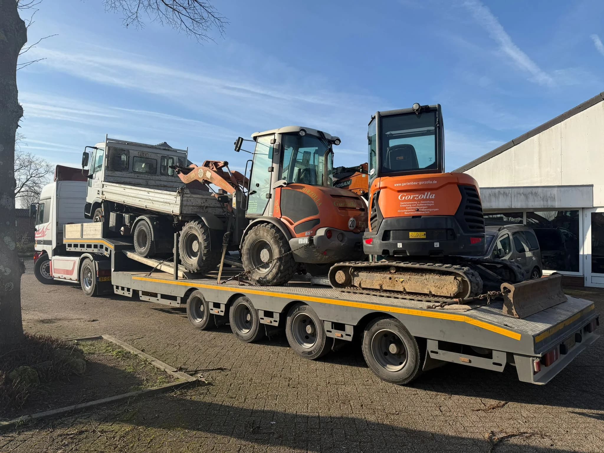 Doosan Radlader Kettenbagger Tieflader Transport NRW — Kettenstark